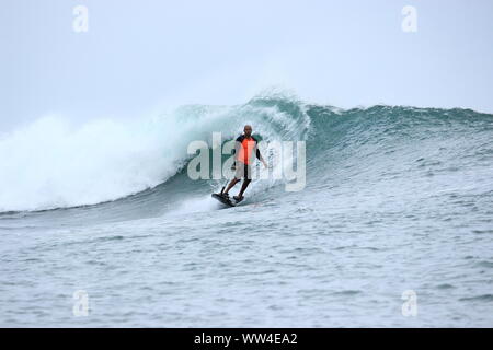 Free surf à Kuta Bali reef Banque D'Images