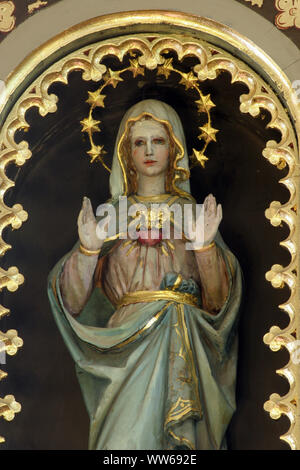 Coeur Immaculé de Marie, statue sur l'autel de l'église de la Saint Pierre à Zagreb, Croatie Banque D'Images