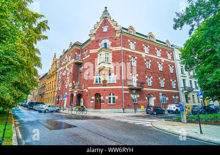 Cracovie, Pologne - juin, 13, 2018 : l'ancien hôtel particulier, appelé sous le Chant Frog situé dans un quartier historique de la verdure environnante dans Banque D'Images