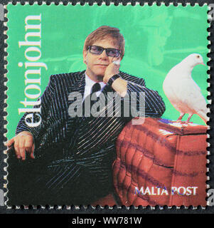 Portrait d'Elton John sur stamp de Malte Banque D'Images