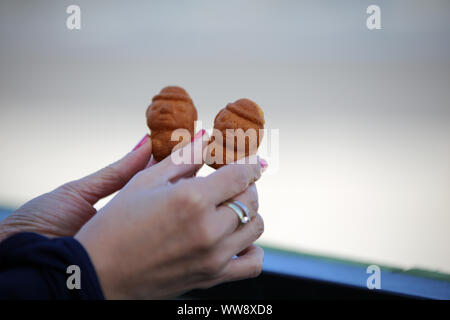 L'île de Jeju, Corée du Sud, de l'alimentation boulangerie sucré rue forme en petit homme Banque D'Images