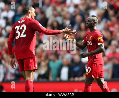 Liverpool, Merseyside, Royaume-Uni. 14Th Sep 2019.  ; Anfield, Liverpool, Merseyside, Angleterre, Premier League anglaise de football, Liverpool contre Newcastle United, Sadio Mane de Liverpool célèbre avec Joel Matip de Liverpool après avoir marqué son deuxième but de la partie après 38 minutes - strictement usage éditorial uniquement. Pas d'utilisation non autorisée avec l'audio, vidéo, données, listes de luminaire, club ou la Ligue de logos ou services 'live'. En ligne De-match utilisation limitée à 120 images, aucune émulation. Aucune utilisation de pari, de jeux ou d'un club ou la ligue/player Crédit : publications Plus Sport Action Images/Alamy Live News Crédit : Action Plus Banque D'Images