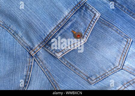 Détail de texture denim usé bleu close up. Banque D'Images