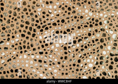 La texture de cuir véritable, close-up, imitation de reptiles exotiques beige, surface mate, l'arrière-plan à la mode Banque D'Images