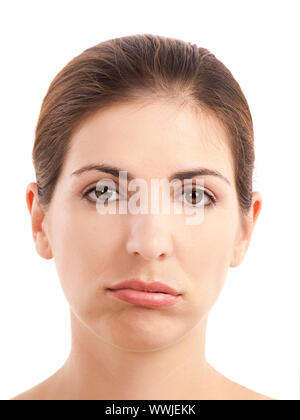 Close-up portrait of a young woman une loquette d'expression, sur un fond blanc Banque D'Images