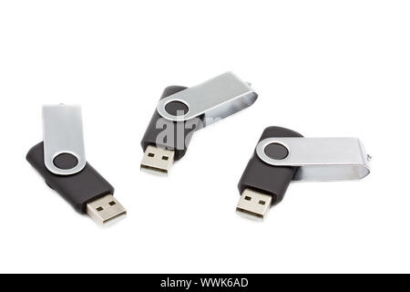 Trois clés USB sur fond blanc Banque D'Images