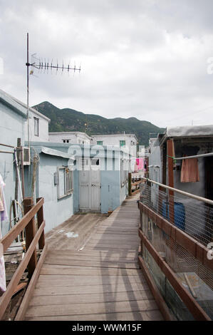 Ruelle dans le village de pêcheurs Tai O, Hong Kong Banque D'Images