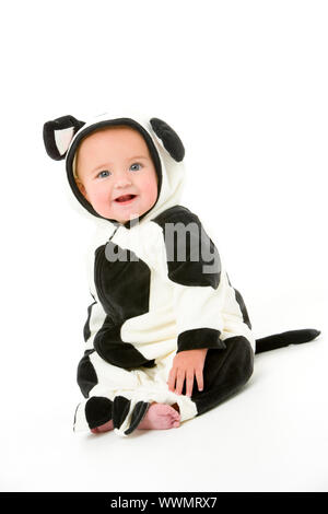 Bébé en costume de vache Banque D'Images