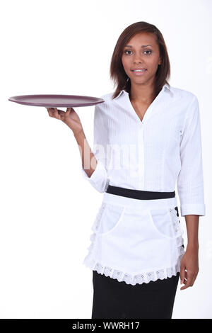 Waitress holding bac vide Banque D'Images