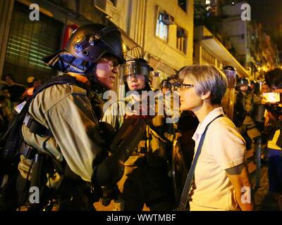 Hong Kong, Chine. 15 Sep, 2019. Un mars non autorisé a dégénéré lorsque des manifestants et la police d'affrontements à plusieurs endroits à Hong Kong. Gonzales : Crédit Photo/Alamy Live News Banque D'Images