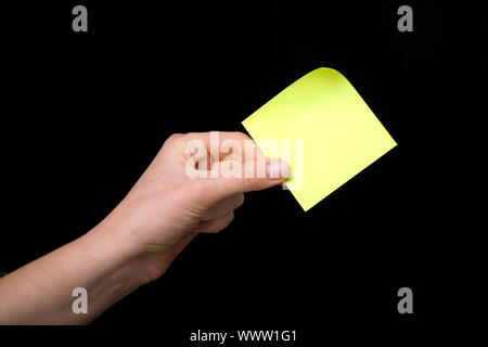 Un post-it collé à une main - se souvenir de cette Banque D'Images
