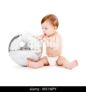 Adorable bébé garçon aux grands glitterball over white Banque D'Images