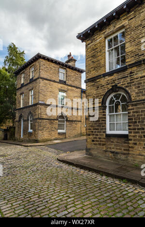 Terrasse Albert, Saltaire, Yorkshire, Angleterre. Saltaire est un modèle village victorien et est un UNESCO World Heritage Site. Banque D'Images