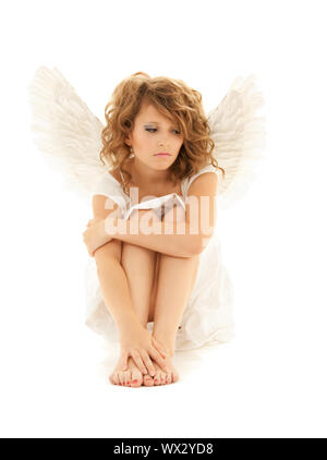 Photo de malheureux teenage angel girl over white Banque D'Images