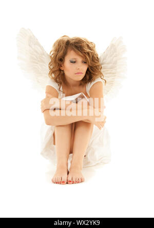 Photo de malheureux teenage angel girl over white Banque D'Images