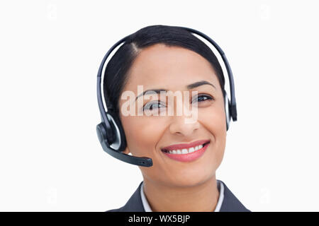 Close up of smiling agent de centre d'appels Banque D'Images
