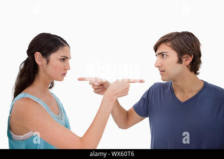 Couple mad at each other against a white background Banque D'Images