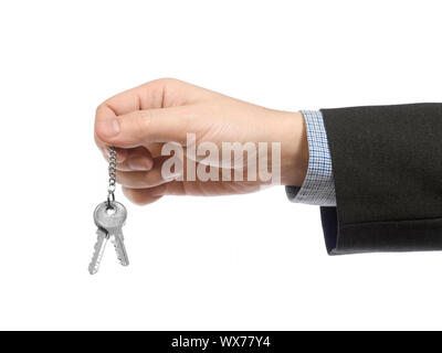 Un business man holding un jeu de clés. Banque D'Images