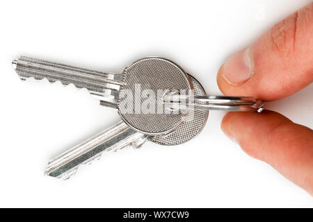 Fabricants détenant ensemble de touches against white background Banque D'Images