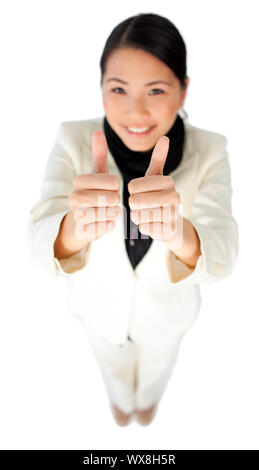 Succès young businesswoman with Thumbs up against a white background Banque D'Images