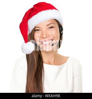 Casque femme de Noël centre d'appels de télémarketing porter du rouge santa hat smiling parlant isolé sur fond blanc. Banque D'Images