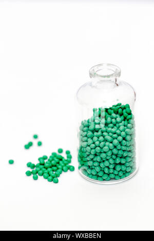 Des granules dans diverses formes et contenants Banque D'Images