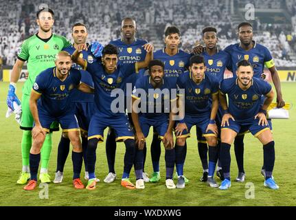 Doha, Qatar. 16 Sep, 2019. Les joueurs à partir d'Arabie's Al-Nassr poser pour des photos de groupe avant leur deuxième match quart de la jambe contre le Qatari Al-Sadd à l'AFC Champions League à Doha, capitale du Qatar, le 16 septembre 2019. Al Sadd a remporté le match 3-1 et se sont qualifiés pour les demi-finales sur un score de 4-3. Nikku Crédit : Crédit : Xinhua/Xinhua/Alamy Live News Banque D'Images