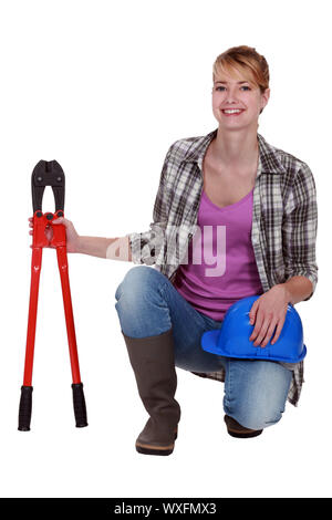 Femme avec une paire de coupe-boulons Banque D'Images