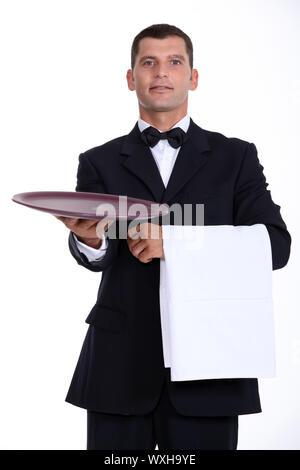 Waiter holding tray Banque D'Images