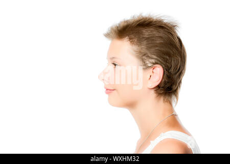 Vue de profil d'une partie d'un visage d'une très jolie fille, isolé sur fond blanc Banque D'Images