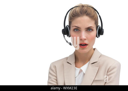 Surpris call centre agent with headset Banque D'Images