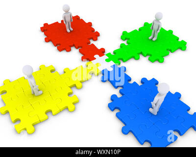 Pièce de puzzle 3d se joint à quatre personnes debout à plates-formes puzzle Banque D'Images