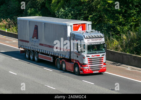 Irish A1: il trasporto pesante di merci alla rinfusa camion di consegna trasporti, autocarro, trasporto, carrello, cargo, veicolo, consegna, trasporti, industria, merci, sulla M6 a Lancaster, Regno Unito Foto Stock