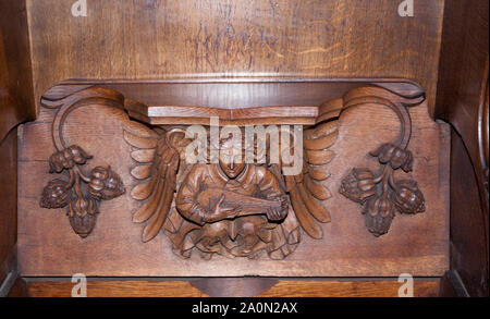 Misericords, San Nicholas Cathedral, Newcastle. Scolpito da Ralph Hedley c.1885. Foto Stock