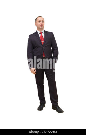 A piena lunghezza Ritratto di una giovane imprenditore in piedi con le mani nelle tasche. Isolato su bianco. Tracciato di ritaglio all'interno. Foto Stock