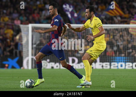 Barcellona, Spagna. 24Sep, 2019. Barcellona, 24-09-2019. LaLiga 2019/ 2020, la data 6. Barcellona - Villarreal. Sergio Busquets del FC Barcelona e Vicente Iborra del Villarreal Credito: Pro scatti/Alamy Live News Foto Stock