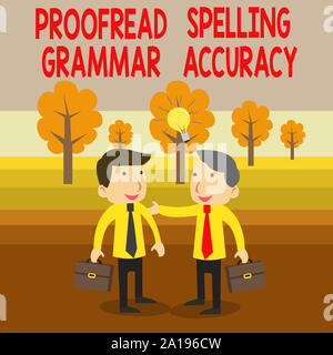 Segno di testo mostra revisionare ortografia accuratezza grammaticale. Business photo testo grammaticalmente corretto evitare di commettere errori di due imprenditori di bianco con i colleghi Foto Stock