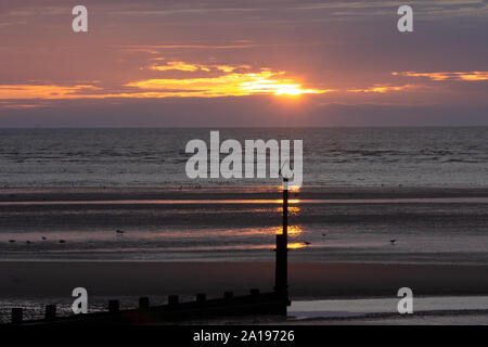 Bel tramonto in Rhyl Beach Wales UK Foto Stock