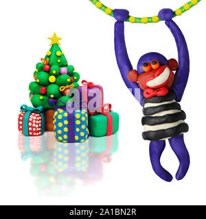 Plastilina albero di natale con la scimmia Foto Stock