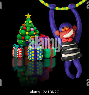 Plastilina albero di natale con la scimmia Foto Stock