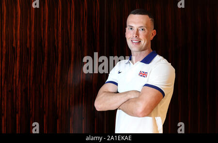 Gran Bretagna Richard Kilty pone per fotografie durante una sessione multimediale al Movenpick Hotel West Bay, a Doha. Foto Stock