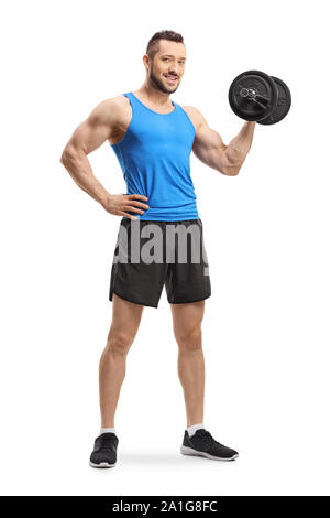 A piena lunghezza Ritratto di un uomo che esercitano il bodybuilding con un manubrio isolati su sfondo bianco Foto Stock
