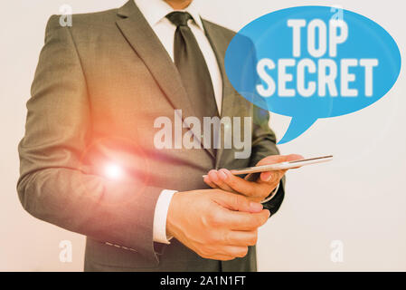 La scrittura della nota mostra Top Secret. Il concetto di business per dire a qualcuno di importante di dati o informazioni che egli cant tell Foto Stock