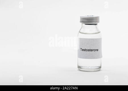 Concetto medico medico che mostra una fiala di medici di testosterone di lettura Foto Stock