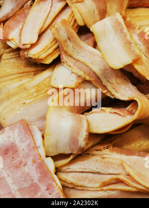 Deliziosa tutta artigianale lastra affumicata pancetta sfondo Foto Stock