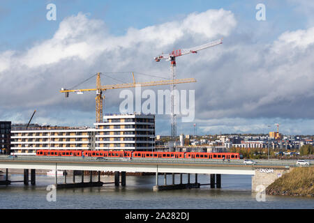 Lavori di costruzione procede attivamente al nuovo Kalasatama area residenziale e degli affari di Helsinki, Finlandia. Foto Stock