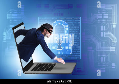 Il pirata informatico uomo cercando di rubare dati personali Foto Stock