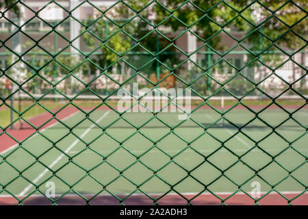 Campo da tennis nella zona dell'azienda. È un buon esercizio. Foto Stock