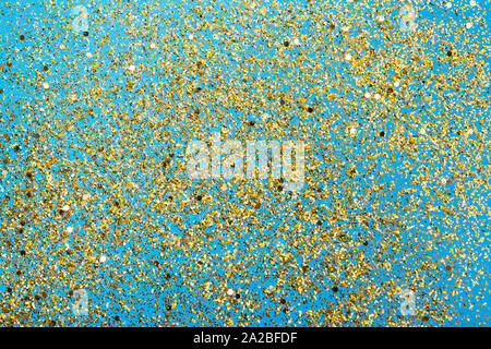 Grandi paillettes olografiche sul classico sfondo blu Foto stock - Alamy