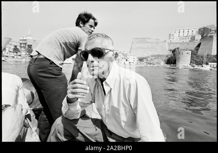 Lo chef Fiat Gianni Agnelli durante il passaggio per il suo yacht a vela Capriccia. L'industriale italiano è in vacanza sull'isola francese della Corsica. Avviso di Copyright: Max Scheler/SUEDDEUTSCHE ZEITUNG foto. Foto Stock